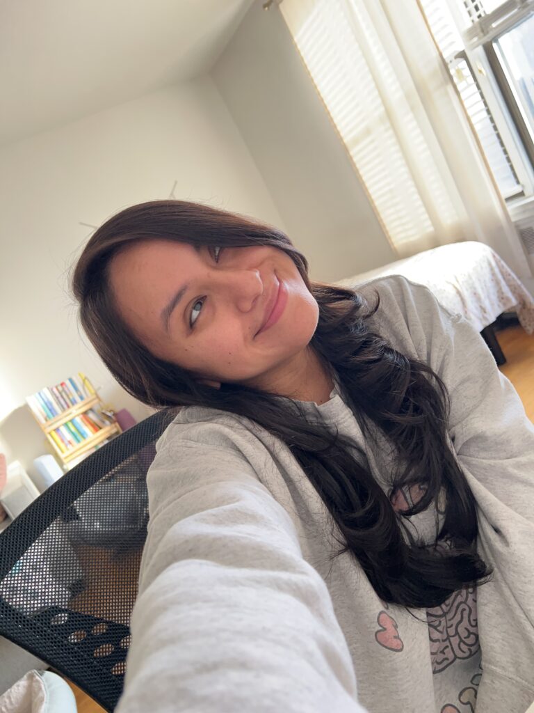 Smiling selfie after leaving school counseling, feeling more like myself.